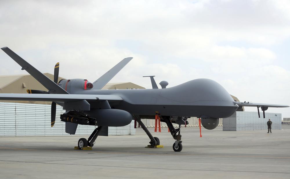 FILE - A U.S. MQ-9 drone is on display during an air show at Kandahar Airfield, Afghanistan, Tuesday, Jan. 23, 2018. A Russian fighter jet Tuesday, Marc 14, 2023, struck the propeller of a U.S. MQ-9 drone surveillance drone over the Black Sea, causing American forces to bring down the unmanned aerial vehicle in international waters, the U.S. military said, an incident that highlighted soaring U.S.-Russian tensions over Moscow's war in Ukraine.  AP/RSS Photo